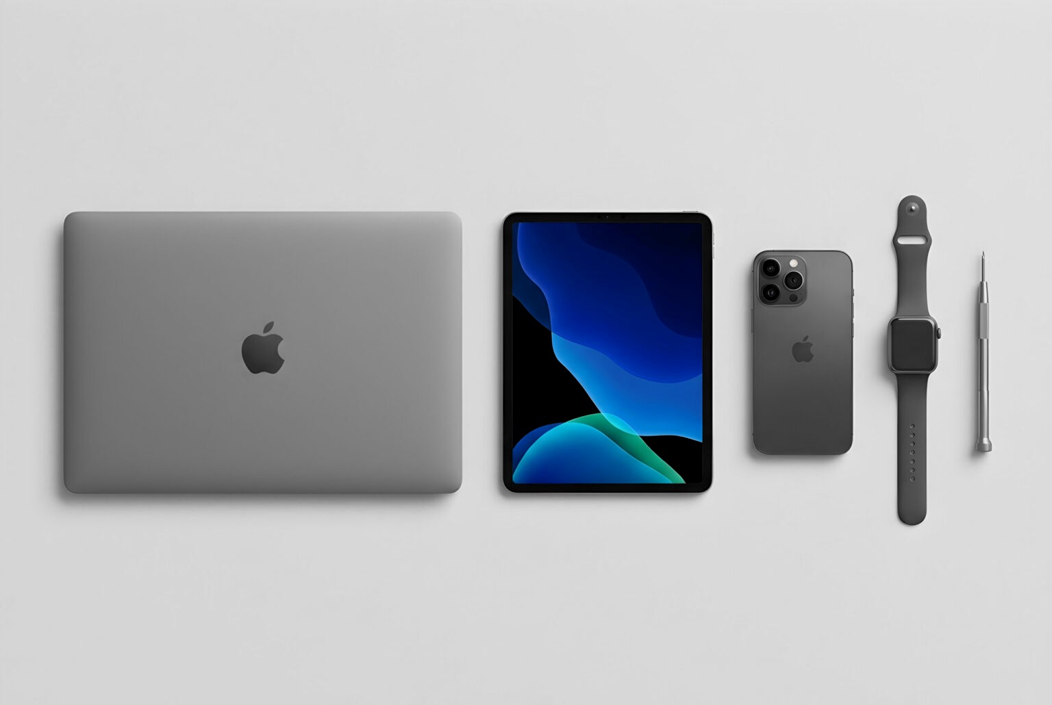 MacBook, iPad, iPhone und Apple Watch nebeneinander – Apple-IT-Services von Landtwing